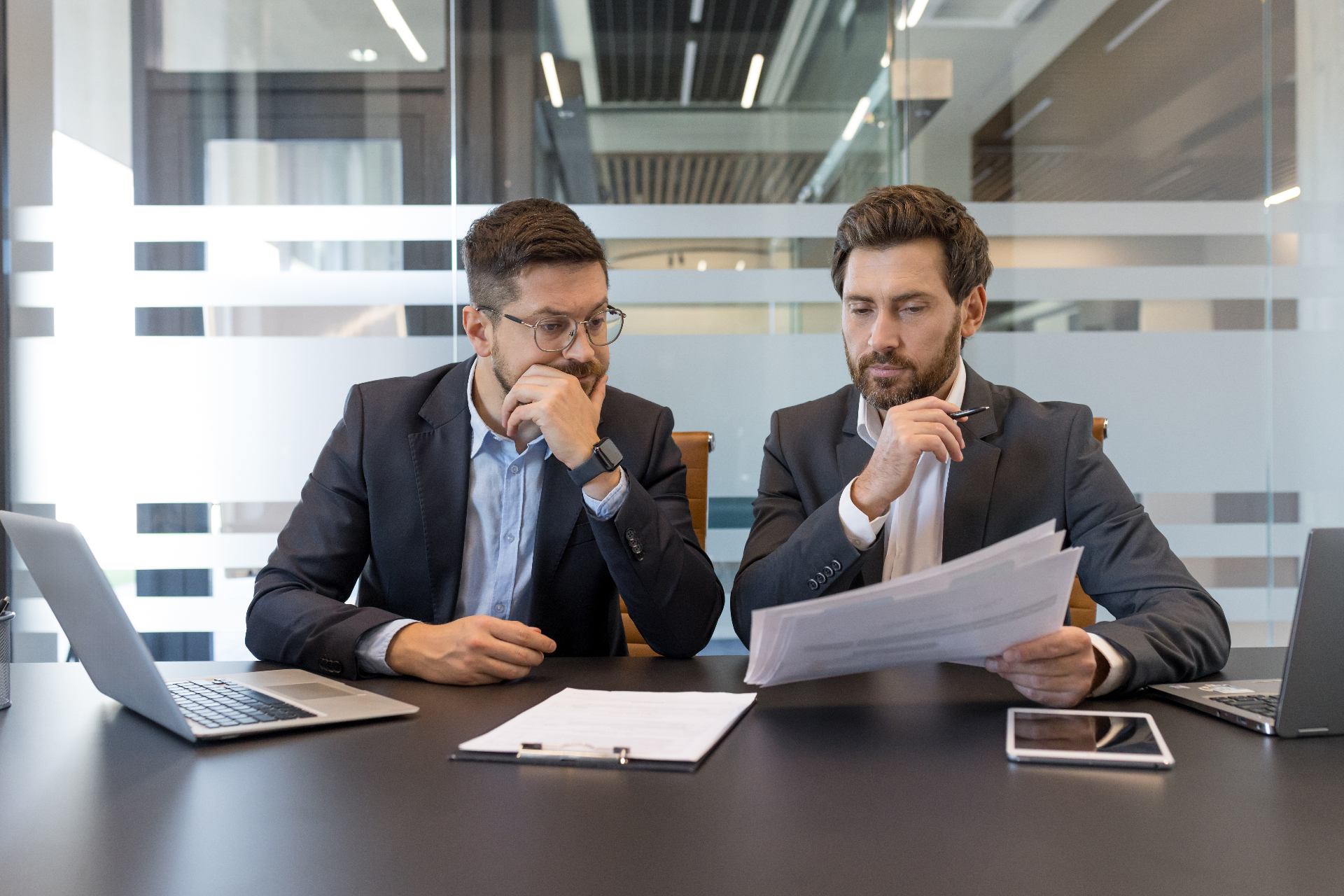 HR leader and manager reviewing case management documentation