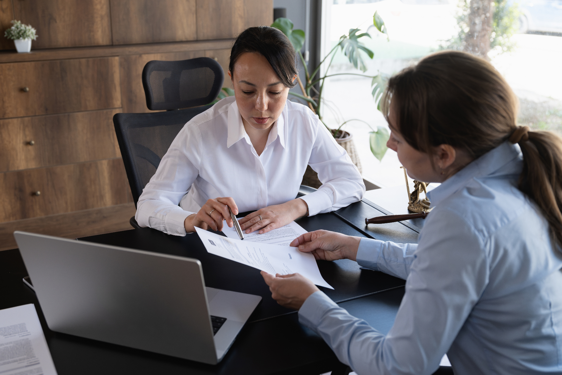 HR leader and manager reviewing workplace complaint intake