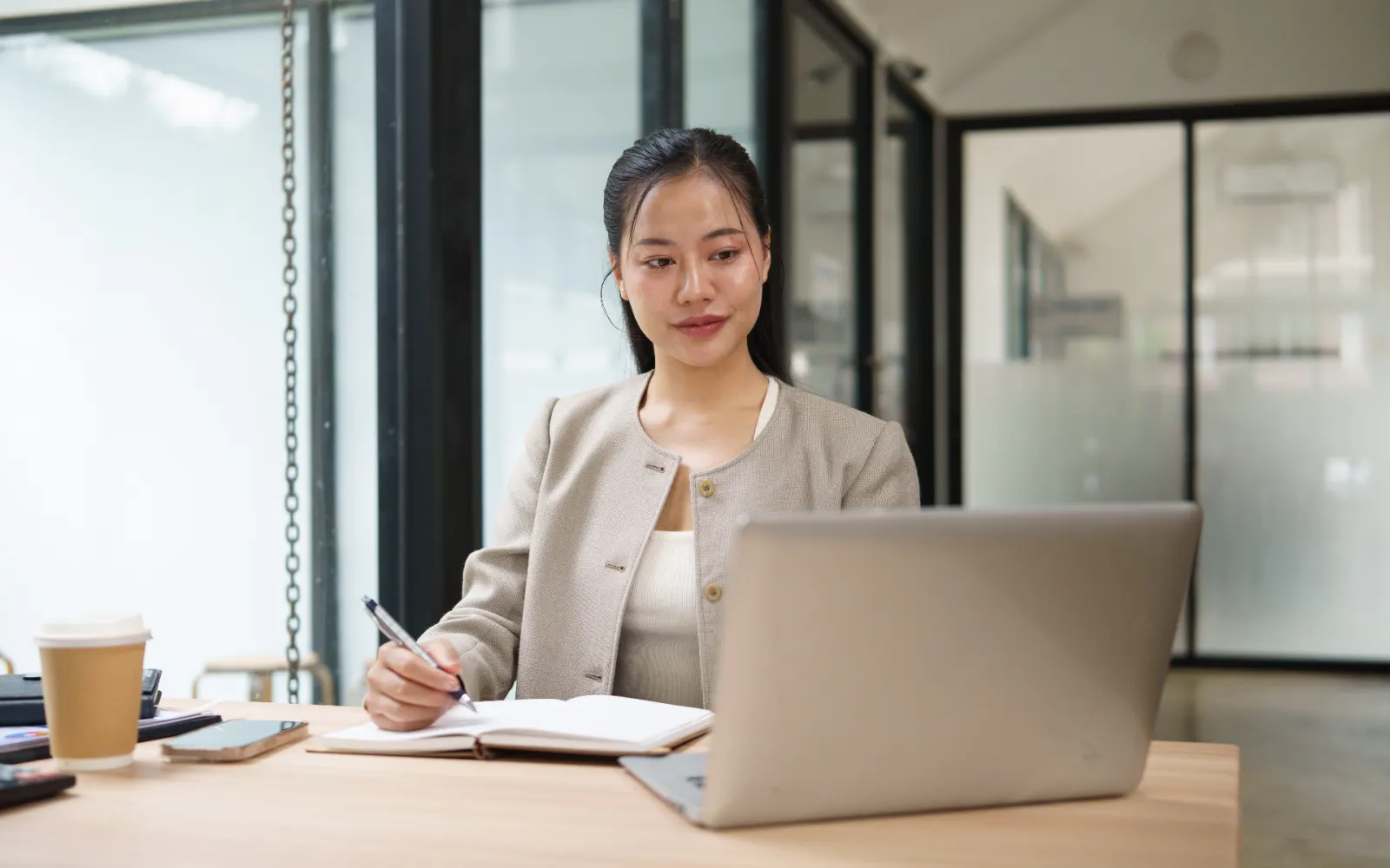 HR leader reviewing personal leave records on a laptop