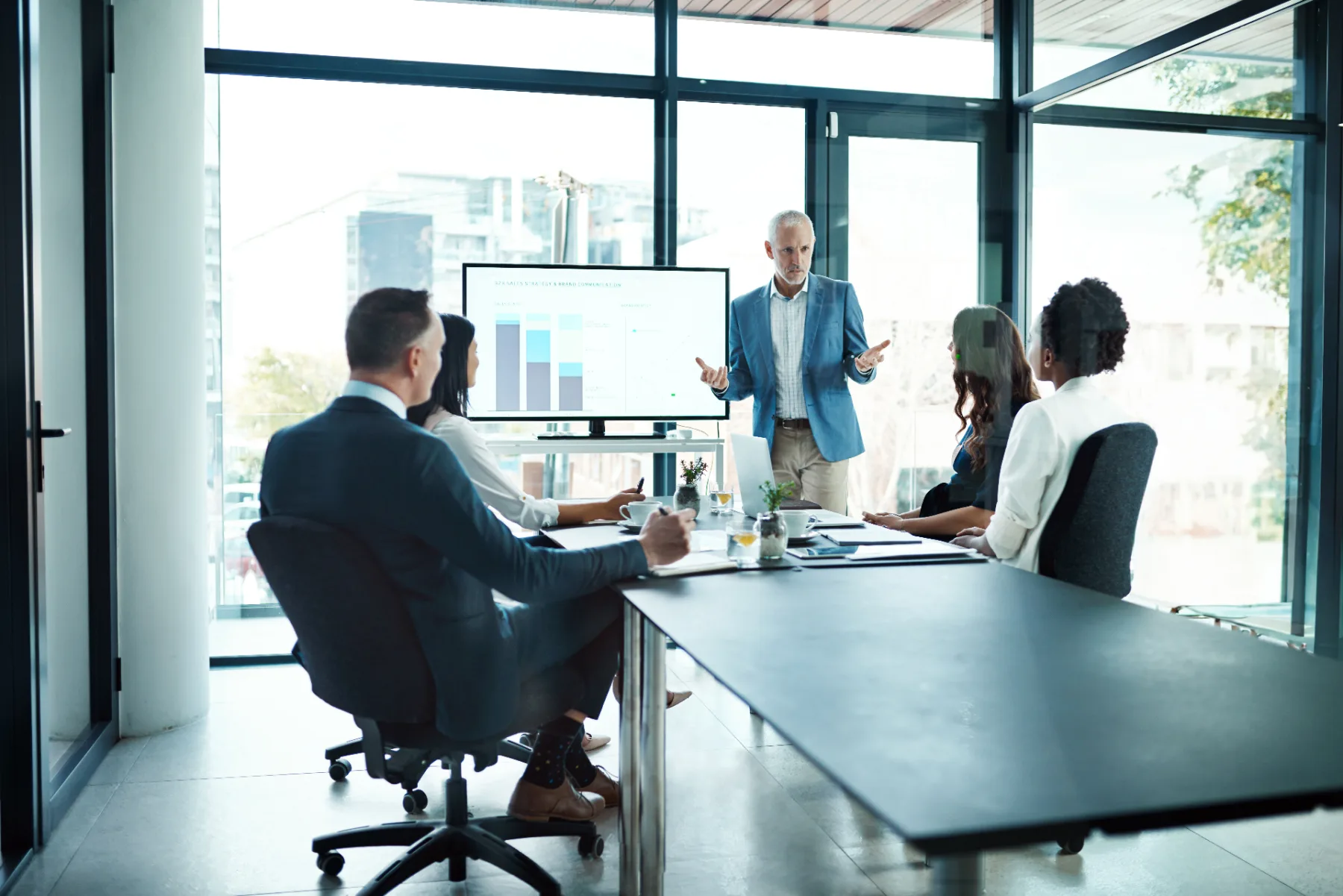 Small-group manager workshop in a professional training setting